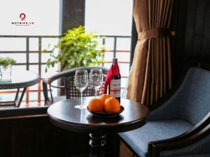 Elegant bedroom with floral arrangement.
